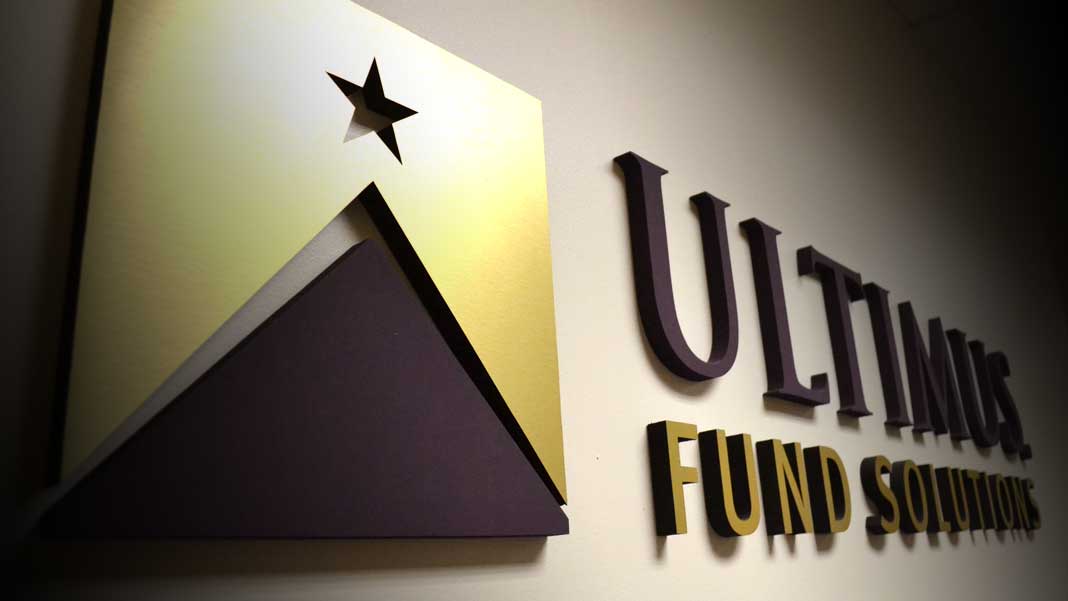 Photo of Ultimus Logo on wall in office